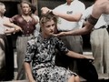 French female collaborator punished by having her head shaved to publicly mark her, 1944