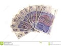 Some British twenty pound notes for you in fan or resembling hand of cards. #bank #bills #money