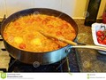 A healthily bubbling cauldron of brown lentil casserole. #stockphotography #brown #bubbling #carrots