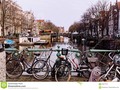 A street and canal scene in old Amsterdam, Holland. #amsterdam #bicycles #bikes #dreamstime #photography #500pxrtg