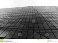 An abstract pattern made from glass window frames in a modern high rise building. #architecture #blackandwhite