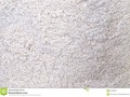 A close-up image of the finely ground buckwheat flour . May be suitable as a background or texture.