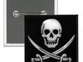 This skull and crossbones(swords) pirate symbol is on a pinback button that is available in round or square shape!…