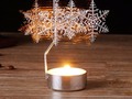 Christmas Spinning Tealight Holders - via sunyoananda