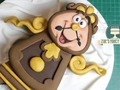 Cogsworth cake : Beauty and the Beast Disney cakes