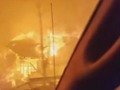 Watch a man's dramatic escape from a raging wildfire in Tennessee