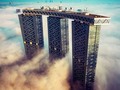 Via: @realestateinvest . The Gates Towers in #AbuDhabi, #UAE!  The Gate Towers consist of a series of towers that act as pillars beneath a curving lintel. This renders the effect of a monumental portal that defines the threshold to the Shams Abu Dhabi district, a newly-created land mass formed as an extension of the Central Business District on exposed tidal sands within a fringe of mangroves at approximately five to seven meters above sea level. The area is gradually developing at a high density and growing in prominence. @tallbuildingsdaily #architect #design #interiordesign #tallbuilding #skyscraper #ig_architecture #buildings #building #archilovers #architectureporn #archi #archimasters #archi_features #archidaily #instaarch #picoftheday #alwayslookingup #dubai #worldshotz #architectural #amazingarchitecture #travel #skyline #travelphotography #supertall #view