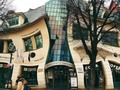 #ArchitectureNow Crooked house, KRZYWY DOMEK, THE EXTRAVAGANT “CROOKED HOUSE” OF SOPOT Krzywy Domek, translated as "crooked house" or "drunk house", is the name of the bizarre building that stands right in the center of the city of Sopot, Poland. It is an out of the ordinary building, a surreal creation with curved and irregular lines that seem to take on an ever-changing springy shape. The house, which “appears” reflected in a gigantic distorted mirror, is not the result of an optical illusion, but rests on solid foundations and was built thanks to the innovative artistry of architects Szotynscy and Zaleski.  The two architects were inspired by the fairy tale illustrations of the Polish artist Jan Marcin Szancer and the poet Per Dahlberg, completing construction in 2004, which immediately after the inauguration was nicknamed the Crooked House. This house, defined as a masterpiece of housing construction, measures approximately 4,000 square meters and is home to residential dwellings as well as the Rezydent shopping center, bars, restaurants and prestigious offices for some of the most well known businesses in the country.  📍 #Sopot, #Poland🇵🇱 📷 aurisha⠀  ®️ All materials presented on this site are copyrighted and owned by the creators listed above. ___________________ #Architecture #Design #InteriorDesign #ArchitecturePhotography #Photography #Travel #Interior #Architecturelovers #Architect #Home #HomeDecor #ArchiLovers #Building #Arquitectura #Construction #Homedesign #Designer #Nature #Luxury #Interiors #ArchitectureDesign #Arquitectura #वास्तुकला #هندسةمعمارية