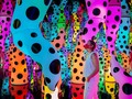 #yayoikusama's 'love is calling' #exhibition grows a mirrored forest of glowing tentacles in @pamm, #miami  the luminous tentacles visually echo in the void, capturing the artistic portrait #kusama has been painting for decades: polka dots. black dots adorn the light sculptures that hang from the ceiling and rise from the floor, immersing visitors in the artist's largest and most kaleidoscopic infinity mirror rooms show to date. __________ #ArchitectureNow All materials presented on this site are Ⓒcopyrighted and owned by the creators listed above.
