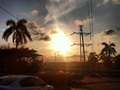 #cars #city #barranquilla #building #cloud #palms #instapic #sky #getdark #afternoon #sun #teamphoto #iphonepicture