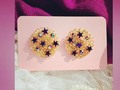 Nido de estrellas morado y tornasol