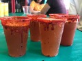 Beer with lime, Valentina sauce, Maggi juice, Worcestershire sauce + chamoy and Chile flavored sugar for this Merced Style michelada. Arely, from our program @80iqmx who works with us guiding tours at La Merced Market, makes the best micheladas in town. She takes the tour to her family stall and introduce our guests to her father, mother, sister and her 1 year old daughter baby Camila. If you want to try this book the Mexican food 101 tour ❤️ #micheladas #beer #mexico #mexicanfood #mexican #mexicocity #foodie #streetfood #foodporn #foodblogger #travelblogger