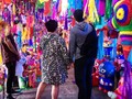 Piñata season is here and the markets are stunning. TB @alexalami @missgeniel one of our favorite couple ever!
