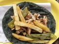 Hand made blue corn tortillas, grilled pork, cactus pads and French fries. Simple yet delicious #taco
