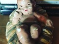 Este niño Jesús tiene mi edad, lo usaba mi madre en el pesebre que armaba en casa… (en Hongo Park)