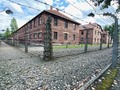 “Arbeit Macht Frei”.  -Auschwitz