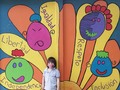 Mi niño sol posando en cada mural, están hermosos los murales de su escuela.  *  Instituto Andrea Jiménez.  *  #creciendocondani  #síndromededown  #CostaRica  #serdistintoesnormal (en Costa Rica)