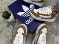 Adidas hombre y dama  Whatsapp 3148050106