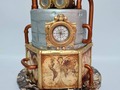 Steampunk blends history, science fiction, and fantasy to create a world with an aesthetic inspired by steam-powered machinery from the 19th century. It incorporates elements of Victorian England and the American Wild West, and often depicts a post-apocolyptic future. Steampunk cake for Nilson !!. Una vez más tuvimos el honor de ser complices de Mary en la sorpresa preparada para Nilson por su cumpleaños.  Es un honor cada año acompañarlos en esta fecha tan especial . #steampunkcake #steampunkstyle #steampunk #marycayacakedesigner #marycayacakestyle #cakesrtist #cakeart #cakeartdesig #cakeartistry #cakeforlife #signaturestyle #tortastematicas #tortasencartagena #tortaspersonalizadas #gumpaste #cartagenabakery #reposteriacreativa #reposteríacartagena