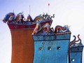 Dragons on the rooftop of the Zhaoming Buddhist temple high in the mountains above Taipei.