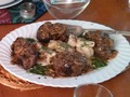 Birthday dinner: entree - seared beef tenderloin topped with a Marsala mushroom sauce, and sauteed lobster tail in a white wine and lobster juice reduction.