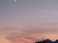 Slender slice of moon over the Sierras.