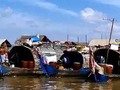 Scenes from Chong Kneas floating city on the Tonle Sap - Cambodia