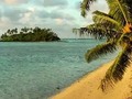 View from the deck of Vara's beach house. Moto in Muri lagoon - Rarotonga, Cook Islands