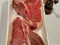 NOT #TonightsDinner needs to Age. Jus't pass these up while pushing my cart through Kroger's ... 2lbs each, I haven't seen #Tbones this pretty (and in my price range) in a long long time! They had a weekend special marking these true Porterhouse Steaks down from $14.99 to $11.99 and this evening they landed in Herman's Corner (too long a story for here) the Butchershop #ClearanceBin marked way, way ... W.A.Y ... down to $7.56/lb, which is like only 57cents a pound more than Chuck Roasts are this week! So unless Wally is packing the car or buying a plane ticket, I'm going to freeze one and age the other until next weekend so it gets good and tender and flavorful! And for those of you watching my diet for me (ya'know who you are) that Porterhouse I'm going to grill to Medium Rare is going to be at least 4 dinners! ‼️‼️‼️ 😋😋😋