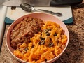 Tonight's Dinner:  A bite of #ComfortFood! Extra Special DeLuxe Mac & Cheese  with added goodies like sliced Bratwurst, diced onions and sliced ripe olives Baked Beans with bacon & onions In desperate need of Comfort type Food ... feeling a bit under the weather with a nasty head cold/overactive seasonal allergies I'm opting for my favorite (and quick and easy to prepare) comfort food. And for those that thought this week's menu had been a little extravagant (seriously folks, I can't afford Surf&Turf every night, but yes, I do tend to post those meals more often than the everyday middle American cuisine) here's me eating a more typical mid-week American supper.  #TonightsDinner  #ComfortFood #MacAndCheese #BakedBeans