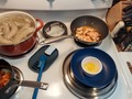Today's Brekkie:  🧀Cheesy Grits & Shrimps!🦐 I'd planned on having #Grits for Brekkie this morning instead of hashbrowns, but making a Louis Ceasar Salad for dinner last night I noticed I had more shrimps than expected and needed to use them up soon ... and Brekkie was the next opportunity!  Now Shrimp & Grits is a traditional breakfast dish in the #Lowcountry of the southern coastal region of the United State, though many others consider it more of a lunch or supper dish. It's fairly simple to prepare once you've got your grits cooked. Yes, if you must, you can use "quick" (5 minute) grits from that Quaker preacher guy, but none of that "instant" stuff! "Real" grits take 25-30 minutes to cook like other whole grains - rice, barley, oats.  While grits are steeping, cook up a slice of bacon per serving, save the rendered grease in skillet, dice the cooked bacon and add to grits.  In bacon grease saute some minced garlic, sliced scallions and diced bell pepper (red or orange looks best, but green is good too, and if you want a little kick add or substitute a jalapeño!) Add shrimps to veggies and sauté quickly, sprinkle with tsp flour and cook into a roux, add a little (⅓ cup/serving) chicken or fish or vegetable stock to pan and stir until sauce sets up.  Stir ⅓cup/serving cubed or grated Cheddar cheese into cooked grits, and place serving of Cheesy Grits in shallow dinner bowl and smother with Shrimps and sauce. For Brekkie or Brunch I like to poach an egg in the Shrimp sauce to top off my Grits & Shrimps. And I had a slice of my sprouted grains Keto Bread smeared with fresh Avocado 🥑.  #TodaysBrekkie #GritsAndShrimp #CheesyGrits  #bacon #AvocadoToast