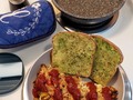 Today's Brekkie:  Yes, it's April 1st, but there's no fooling around with this Frittata! Only had half a serving of homemade hashbrowns left (I use medium Yukon Golds julienned through the mandolin then blanched, drained, and kep in fridge through the week. This process turns much of the regular high-glycemic potato starches into low glycemic #ResistantStarch which doesn't severely spike blood glucose). So my scant taters started browning in a dab of bacon grease with some minced onions and Jalapeño. In another pan I sautéed ½ cup of red&green sweet peppers, ⅓ cup onions, with a sliced and diced hot Italian sausage. A couple eggs were scrambled and sprouted grain lo-carb bread was toasted. After taters were browned the meat & veggie sauté, plus eggs, were mixed in and cooked semi-firm. A sprinkle of grated Italian cheese mix over the top and slip pan under the broiler (airfryer) to finish eggs and melt cheese.  Fold Frittara in half to plate and dribble a little Chili Sause (tricked out ketchup) and enjoy with Avocado 🥑 Toast! #TodaysBrekkie #Frittata #Hashbrowns #eggs #peppers #ItalianSausage #AvocadoToast