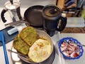 Today's Brekkie:  Hot Italian Sausage Bowl Avocado Toast Fresh Strawberries & Cream Woke up a little early and Bright-eyed & Bushy-tailed . . . well at least Bright-eyed!  My Brekkie Bowl starts with my keto-prepped Yukon Gold taters, pan fried with diced onion and bell pepper, and chopped Hot Italian Sausage. Topped with a sprinkle of shredded cheese and two eggs over easy. Recently I've had a surprisingly wonderful and tasty run of creamy just ripe Avocados, and today's Mayan Fruit didn't disappoint either! Spread generously on toasted Sprouted Grain lo-carb bread, with a few grinds of pepper and sprinkle of Mrs.Dash. This morning I'm enjoying a rather large bowl of fresh Strawberries because one of the remaining berries in box had begun to mold so I washed and quartered all of the rest, dusted them with a little Stevia and doused them with heavy cream (decadent, yes ... but #Delicious 😋).  And my BIG blue mug full of Café Italiano!  Buon Appetito & Ciao mi Amici!!! #TodaysBrekkie #Hot #ItalianSausage #Avocado #Toast #Fresh #Strawberries #Cream #CafeItaliano