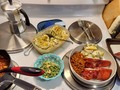 Tonight's Dinner:  Smoked Char Sui Baby Back Ribs Potato Salad, Pea Salad, Crushed Garlic & Thai Sweet Chili Baked Beans.  A little #Asian #Fusion switch-up for the Holiday weekend barbeque.  I really wasn't planning on cooking #Ribs this weekend, but a Friday trip thru the market for a loaf of my keto bread revealed an unadvertised super special on Baby Back Ribs for the same $1.99/lb as the advertised St.Louis cut Ribs ... so I grabbed a rack! Back at home I noticed there was still half a jar of Char Sui - Chinese barbeque sauce - from when I made Char Sui Pork Belly a few weeks back. I slathered on a goodly coating of sauce on the ribs and swathed them in plastic wrap and set the ribs in fridge ti marinate overnight.  Started beans in pot with usual baked bean mix of tomato sauce, spices, several smashed cloves of garlic and substituting Thai sweet chili sauce for my regular Stevia brown sugar blend. Pare-boiled a couple diced moderate sized Yukon Gold spuds, rinsed & drained with couple changes of cold water and put in fridge to chill for the afternoon.  Pulled marinating ribs from fridge to warm up. Had soaked some Pecan wood chips this morning, drained them, and packed the smoker box and setup the grill. When grill reached 300°F placed rack of ribs on upper shelf of grill and turned off the burners except for the one under the chip box and let ribs slowly smoke all afternoon at about 265-275°F. During final 90 minutes before dinner, brushed ribs with more Char Sui sauce every 20 minutes for an hour, then turned off grill and let ribs sit in the warmth. In between saucing ribs I hard boiled some eggs in the Instapot (6 mins, low pressure, quick release, then cold water bath for quick & perfect easy to peel eggs!). Then chopped celery, sliced scallions and radishes, diced Bread & Butter pickles, made dressing and assembled the Potato Salad. Ribs were cooked through after 4½ hours, thin crisp outer and moist tender succulent fall off the bone inside. Very sweet, slightly salty, and very very sticky!  This Fusion Barbeque was very 😋 YummY 😋   #TonightsDinner #smoked #CharSui #BabyBackRibs #barbeque #bbq #PotatoSalad #PeaSalad #ThaiSweetChili #garlic #BakedB