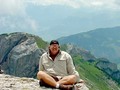 Sitting on Top of the World  . . . ok . . . previous photo depicted me having hiked halfway up, I made it to the top, after dodging cows and goats grazing on the lower and middle slopes. I'm now sitting on top of Mount #Pilatus high above #Luzerne #Switzerland