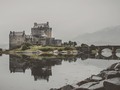 Eilean Donan Castle | Scotland, July 2018 . . . . #travelgram #travels #scotland #visi #highlands #castle #eileandonancastle #reflection #mirrorlake #fog #mist #grey