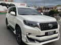 Prado VX dubai 2022 título 2-1 12 mil km  Ubicación #valencia  Tapicería beige  Botón de encendido  Pantalla digital  Quemacoco  3 filas de asientos  Precio 100k  Info al número de perfil