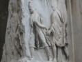 Detail of Roman bas relief on a column base