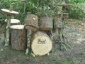 Pearl Neanderthal Series  Recommended for heavy bashing,brutal handling and hard time knocks. Foe to termites, fire and lumberjacks.  Custom specs; 14" snare drum 12" hi-hats W custom 9" rack toms 14" side cymbals 20" bass drum White freckled green finish colour, sanded with wood chippings and dew water.  #pearl #drums #gogreen #series