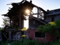 Abandoned barn at sunset